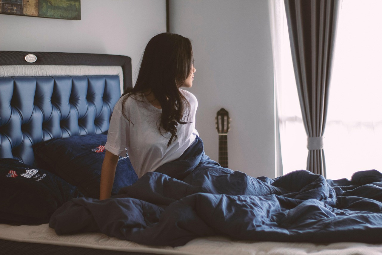 Representative image: woman resting in bed
