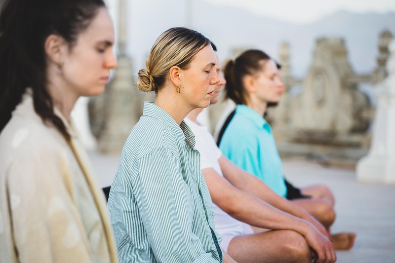 Representative image: seated yoga breathing exercise