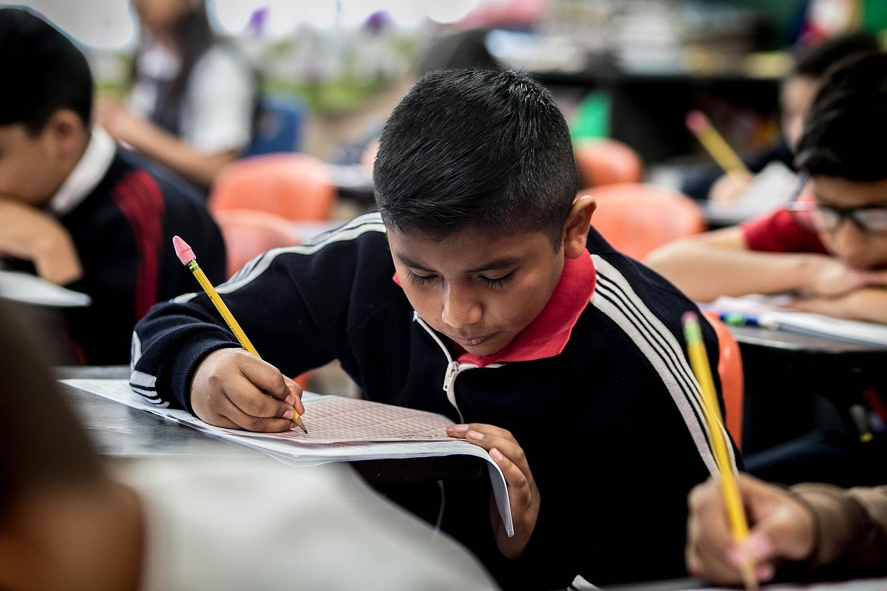 Representative image: students writing an exam