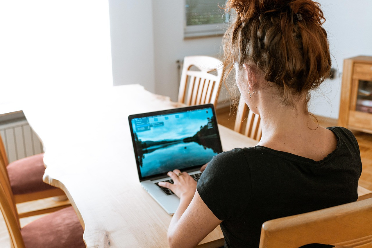 Representative image: woman working at office desk
