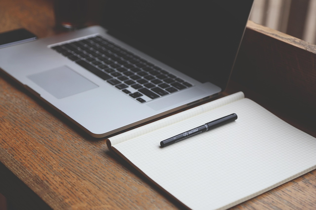 Representative image: young intern office laptop