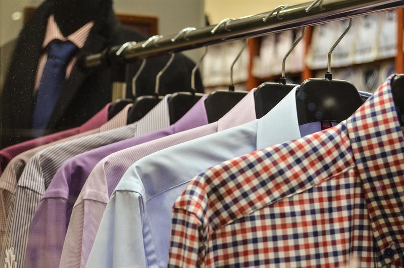 Representative image: men's suits on clothing store rack