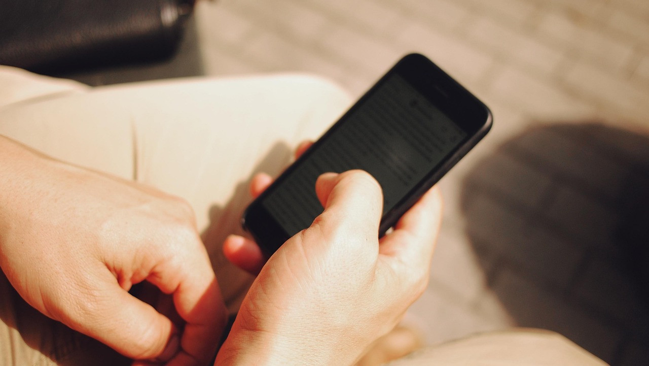 Representative image: person scrolling smartphone