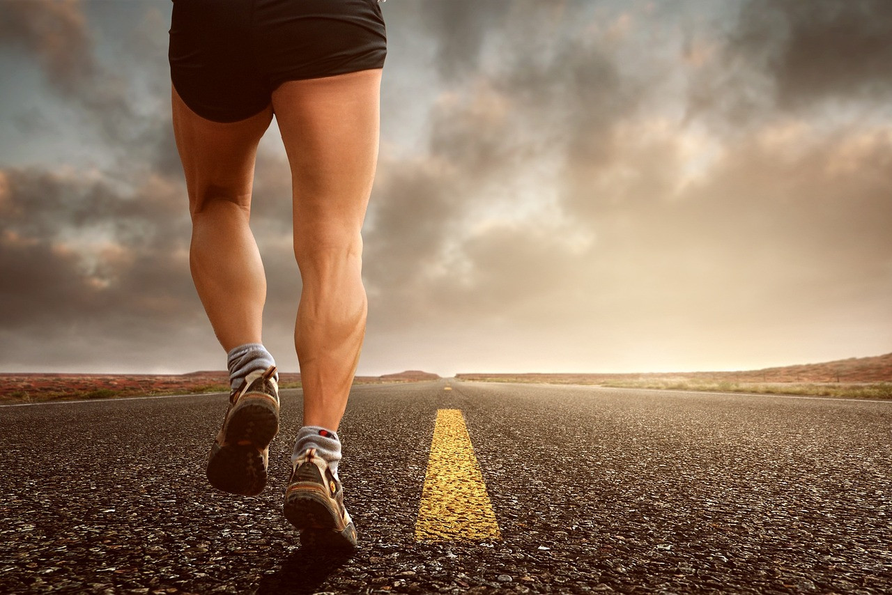 Representative image: runners on a city road race