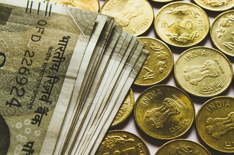 Rupee posts best day in six months after RBI curbs; bond yields hit three-year high