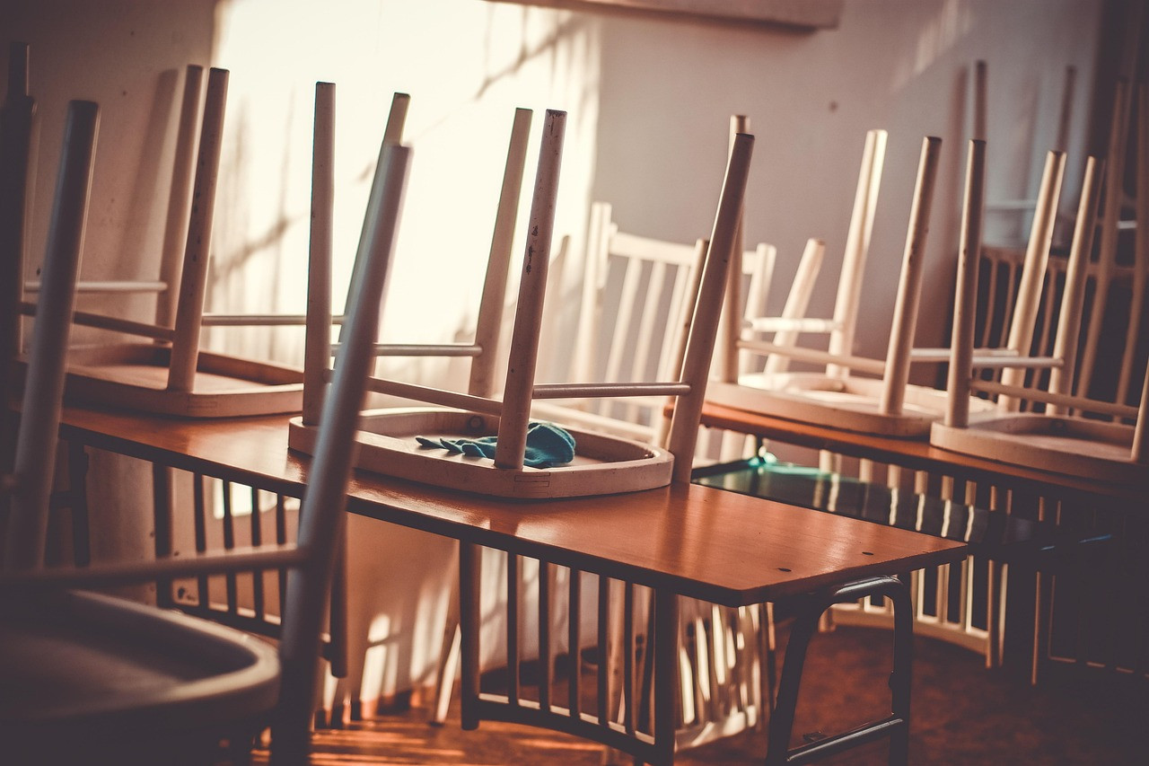 Representative image: empty school classroom desks