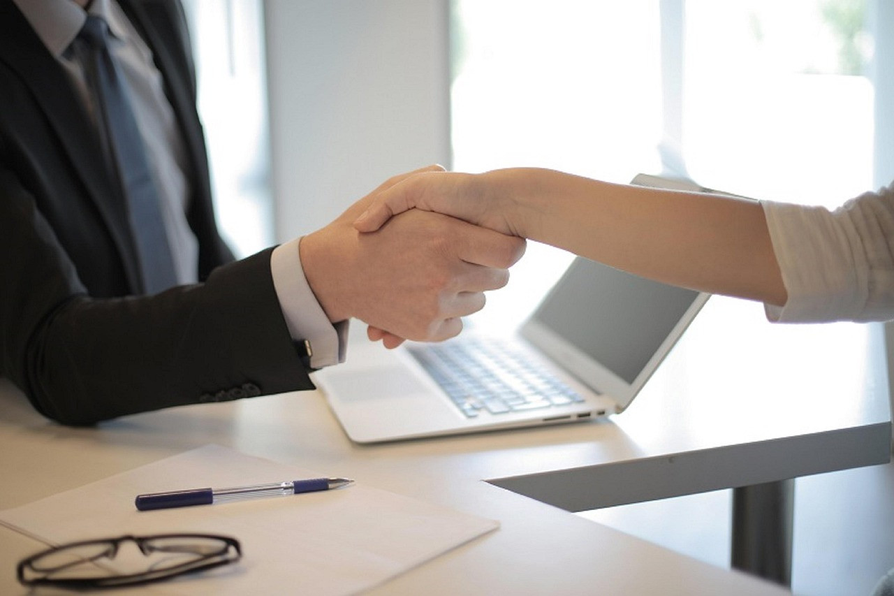 Representative image: job interview handshake