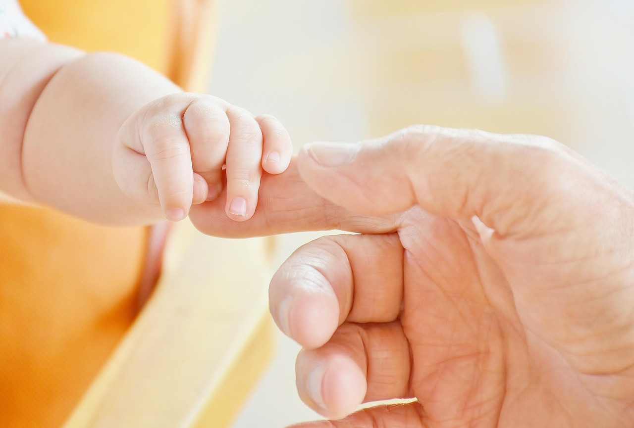 Representative image: parents holding newborn baby