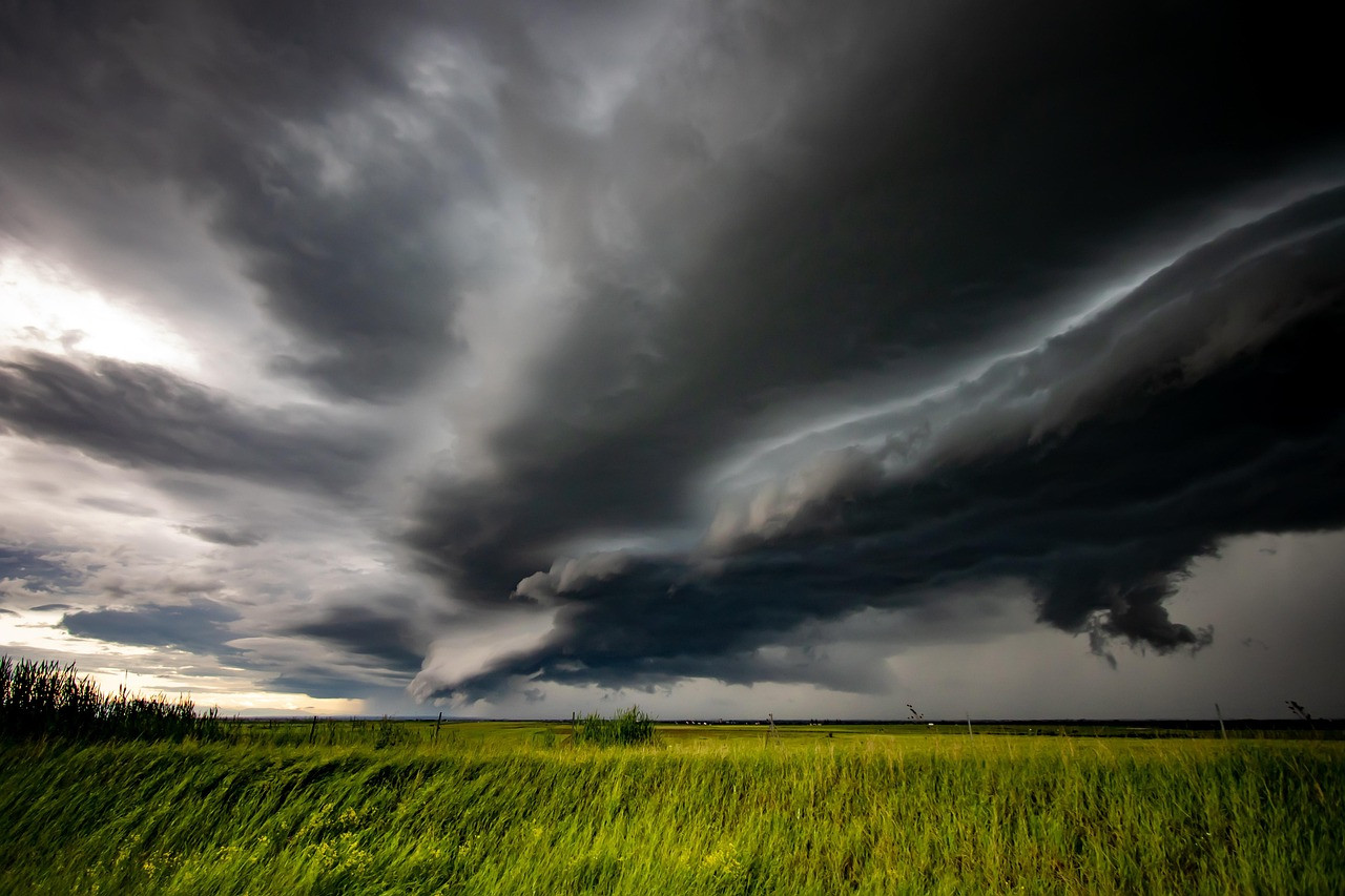 Representative image: rain clouds over field