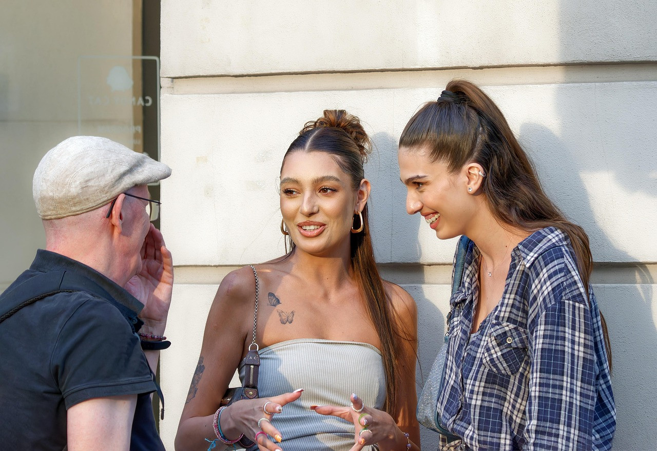 Representative image: young people talking in a cafe