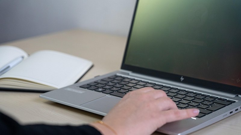 Representative image: office team working on laptops