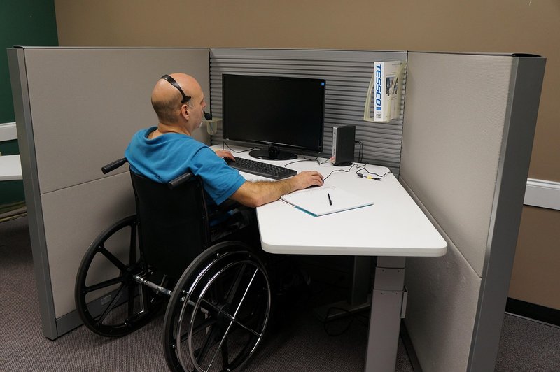 Representative image: counsellor telephone headset desk