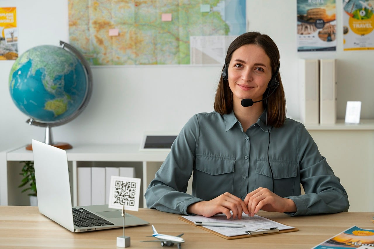 Representative image: travel agent office with laptop