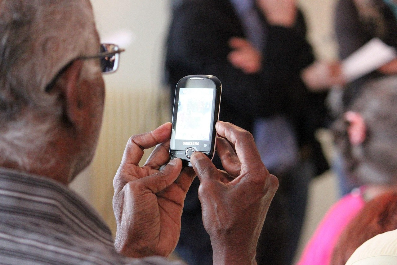 Representative image: person using smartphone