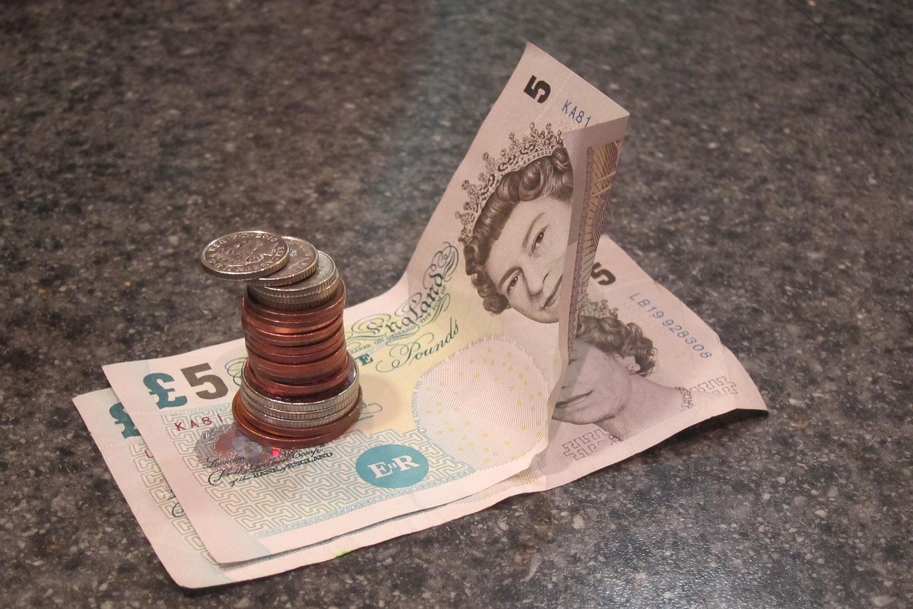 Representative image: pound sterling coins and notes