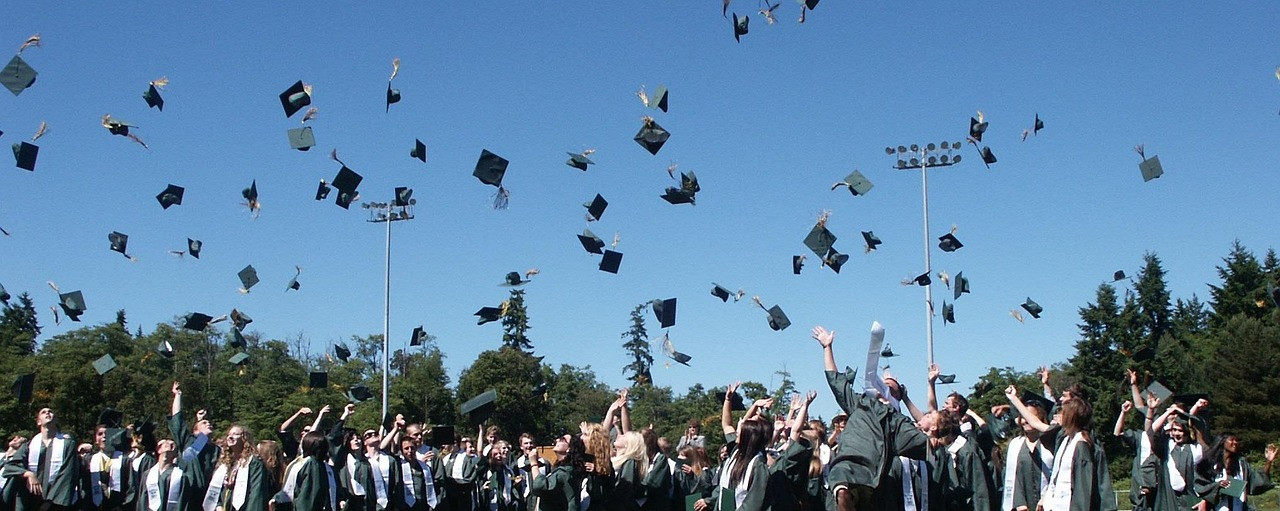 Representative image: graduates in caps and gowns