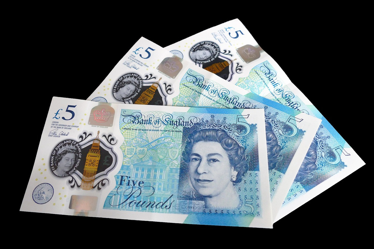 Representative image: british pound coins and notes