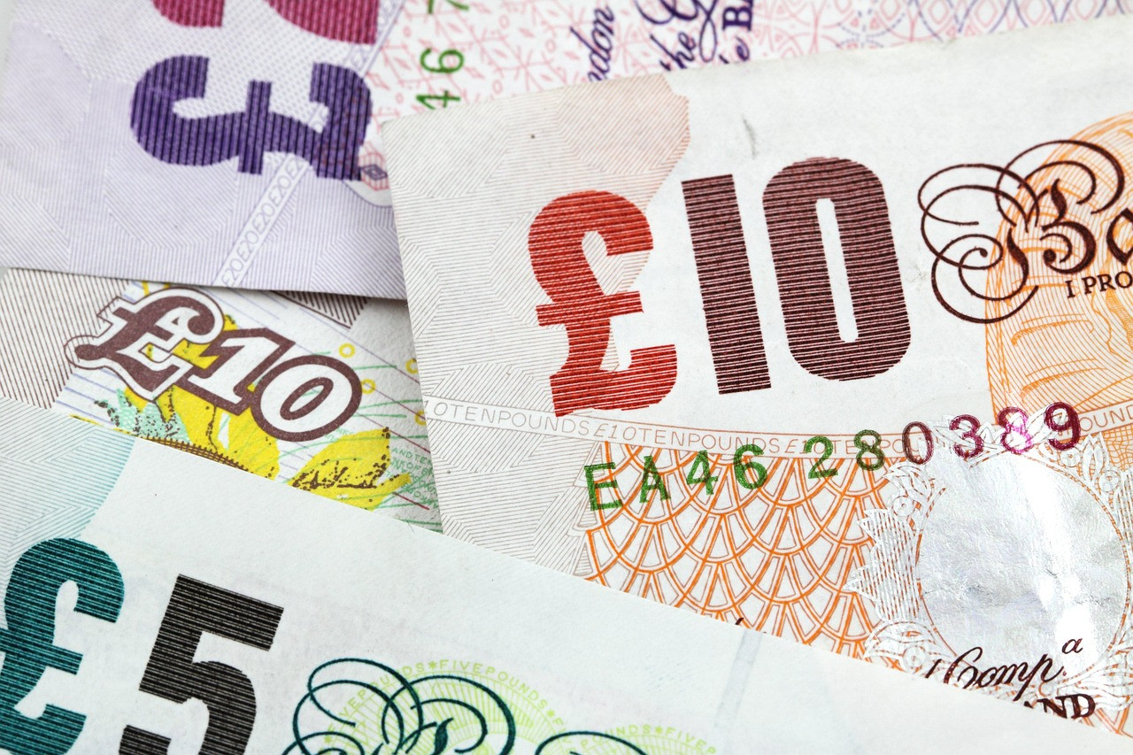 Representative image: british pound coins and notes