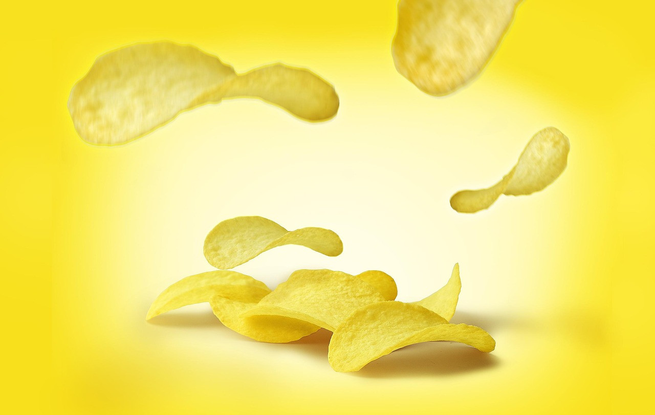 Representative image: packaged snacks chips biscuits