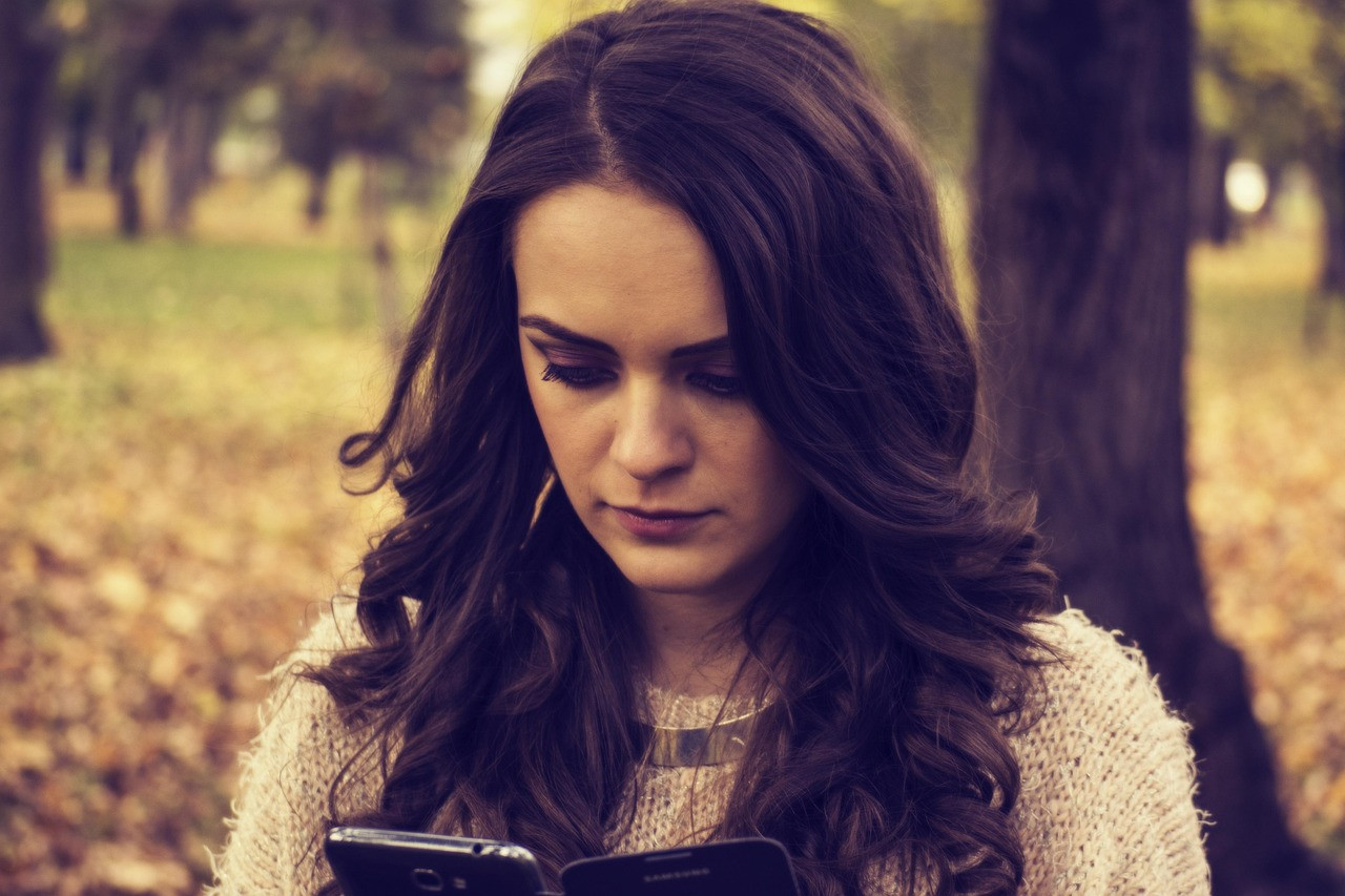 Representative image: teenagers looking at phones