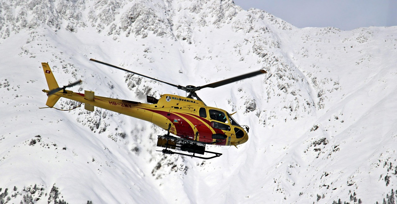 Representative image: helicopter over mountains