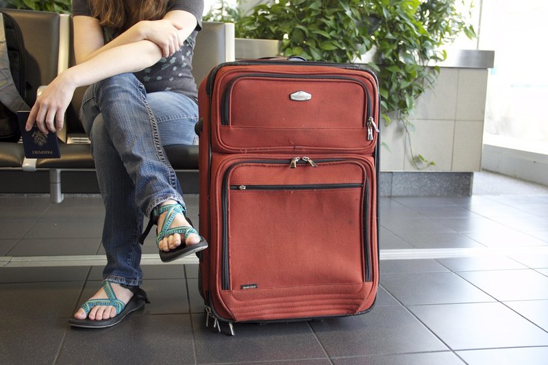 Representative image: passport suitcase airport