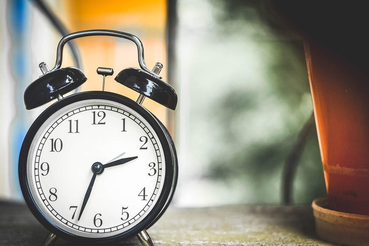 Representative image: alarm clock on bedside table