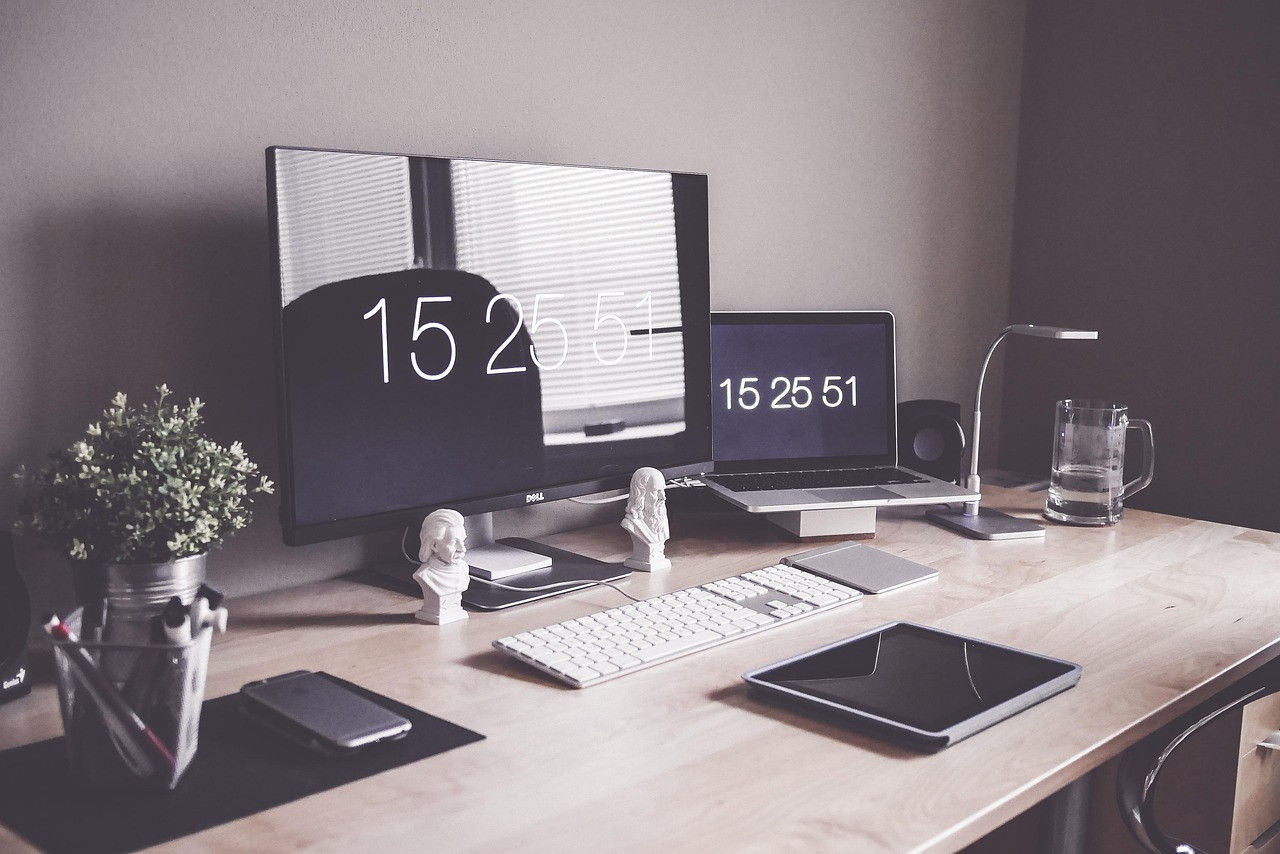 Representative image: office workers at computer desks