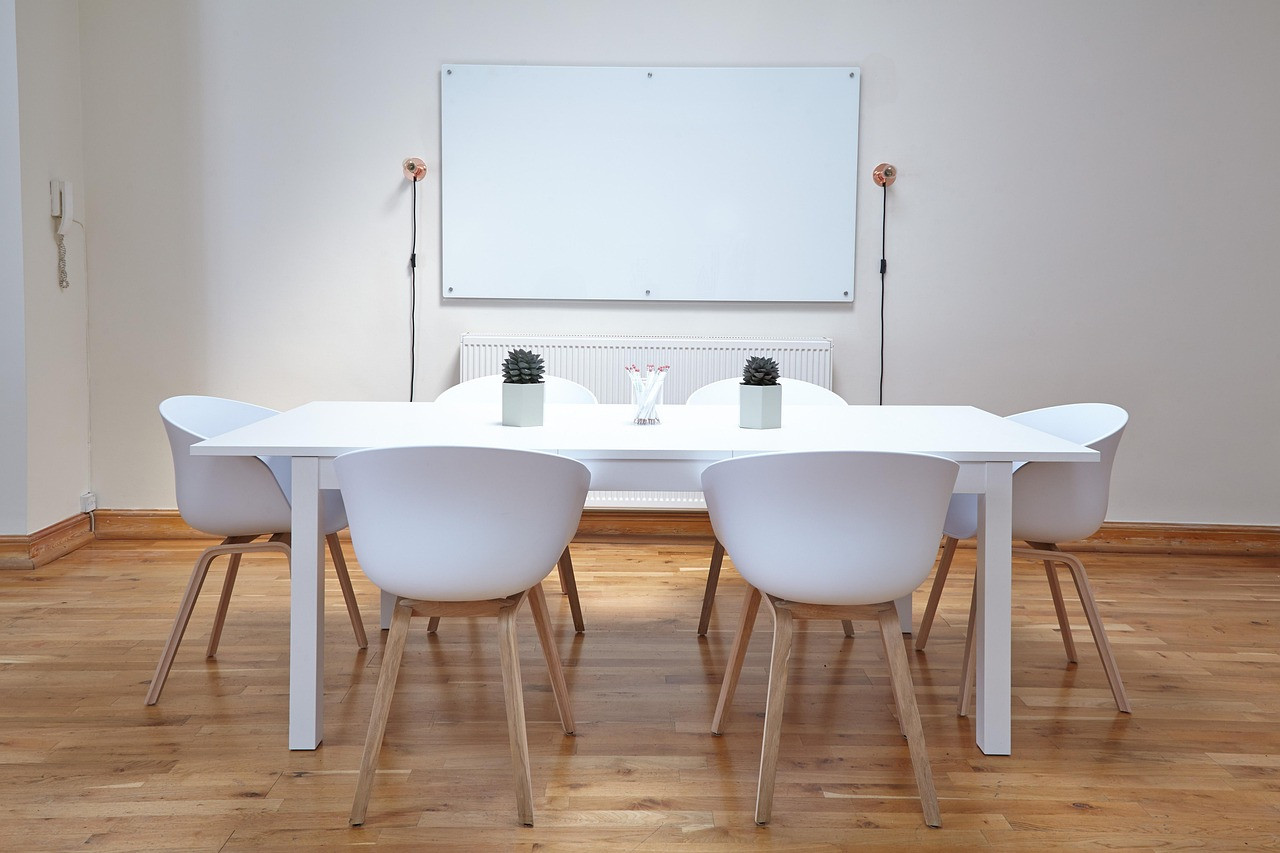 Representative image: businesswomen at a conference table