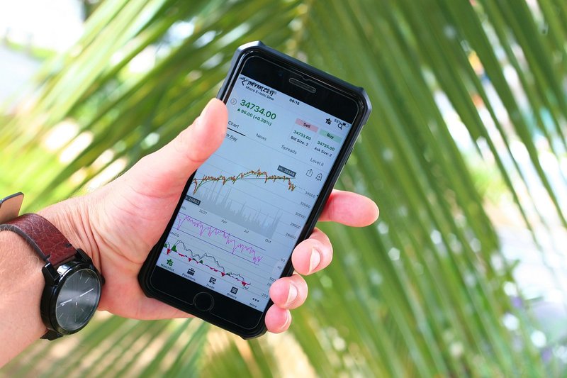 Representative image: stock market trading app phone